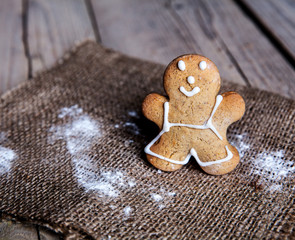 Christmas homemade gingerbread cookies on wooden table