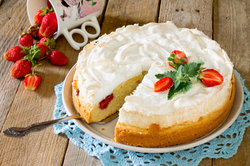 Meringue Cake with strawberries in a rustic style