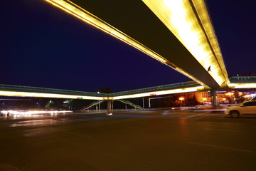 Fototapeta na wymiar Urban footbridge and road intersection of night scene