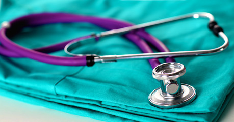 Stethoscope on a background of medical coat