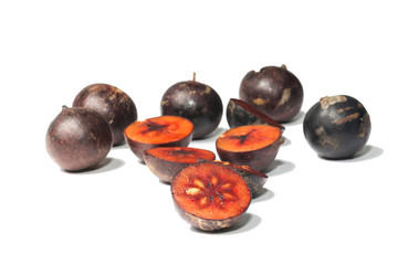 Flacourtia fruit on white background
