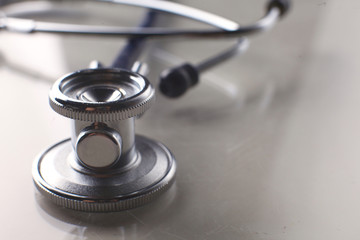 Medical stethoscope in white background