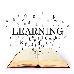 Learning, word on the book with letters flying