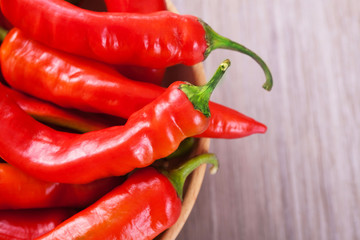 Chili peppers in a bowl on the table