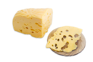 Piece of cheese and a thin slice on a saucer