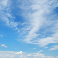 white clouds on a blue sky background