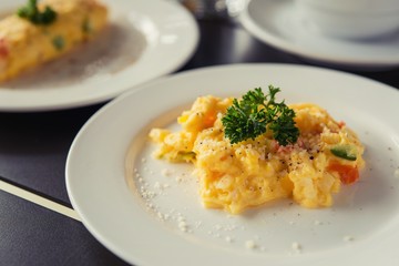 Omelets, breakfast served with coffee and croissants.