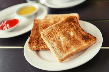 Toast, jam, served with set breakfast.