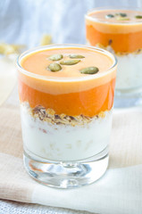 granola with yogurt, pumpkin hard sauce and seed