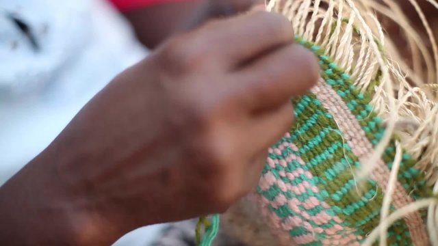 Hands Weaving a Basket Tight Shot