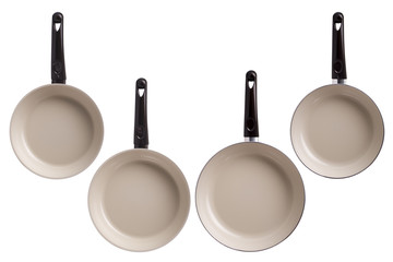New kitchen pans isolated on white background