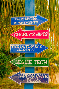 Tourist signs in placencia beach, belize