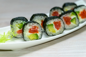 Close-up  Maki sushi arranged on plate, shallow depth of field,