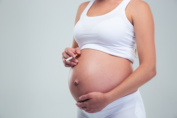 Pregnant woman smoking cigarette