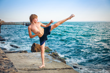 Young boy training karate © Andriy Petrenko