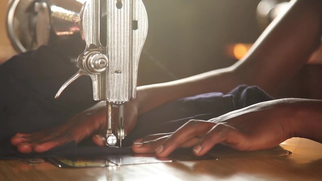 Sewing with Machine in Sunlight