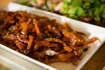 Fried pork served with rice in the morning.