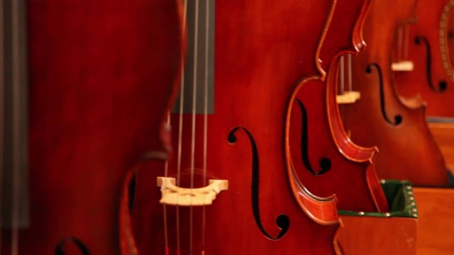 Cellos in a Row Dolly Shot