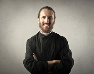 Smiling priest