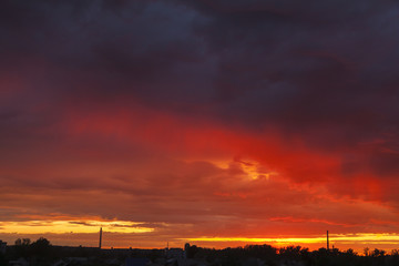 Fototapeta na wymiar Colorful sunset above city