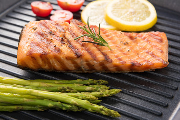 Grilled salmon cooked BBQ on a pan