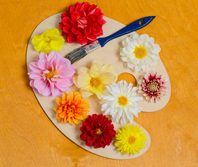 Obraz na płótnie Canvas bright flowers on a palette