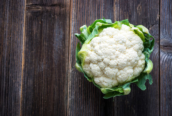 Cauliflower on wooden background
                        