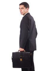 Young businessman holding suitcase isolated on white