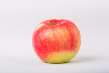 Fresh red apple isolated on a white background