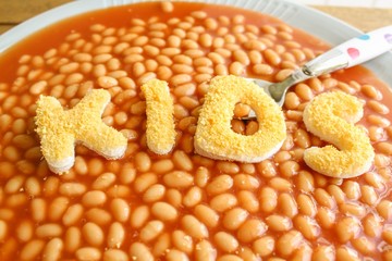Kids Meal - Baked beans with tomato sauce with breaded letters spelling the word KIDS