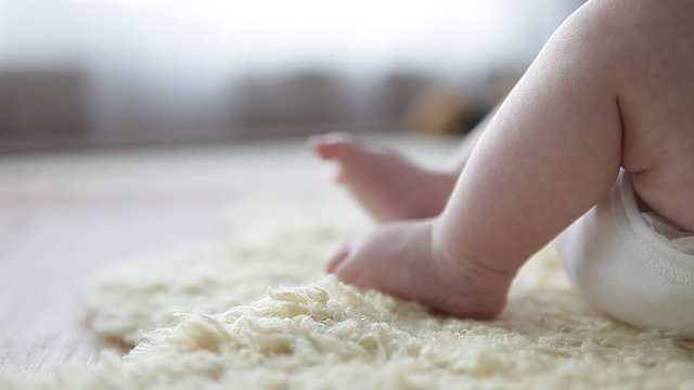 moving feet of a little baby