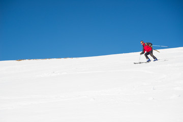 Fototapeta na wymiar Skiing on the majestic italian alpine arc