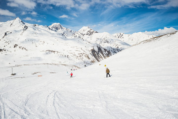Fototapeta na wymiar Speed skiing in scenic alpine resort