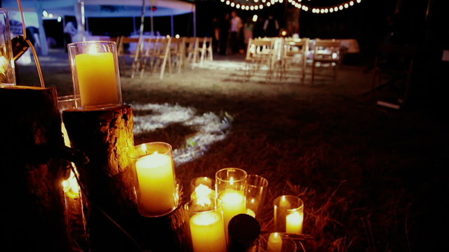 Candles on the background of a wedding ceremony
