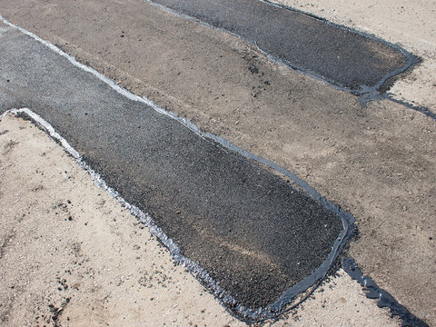 Repair pavement and laying new asphalt