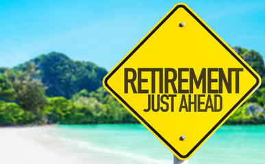 Retirement Just Ahead sign with beach background