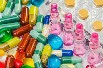 ampoule and pills shot