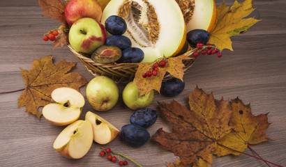 Melon,apples and plums of autumn still life