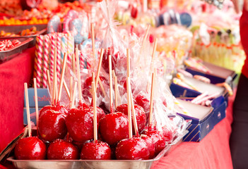 Glazed apples and candies