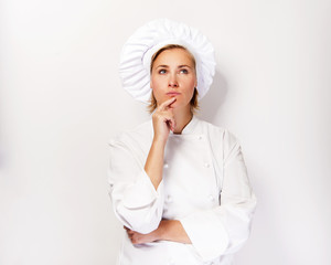 Woman chef look up and thinking with finger near her face, over