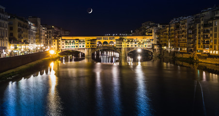 Fototapeta na wymiar Night view of the river in Florence Italy