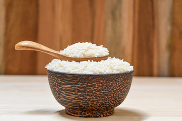 close-up of jasmine rice on wooden table