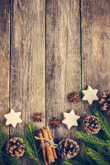 Christmas background with fir branches, pine cones, christmas co