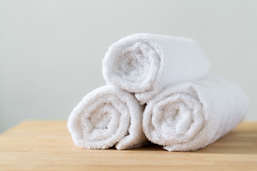 Fototapeta na wymiar Roll of white towel for spa