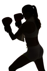 one caucasian woman boxing exercising in silhouette studio isola
