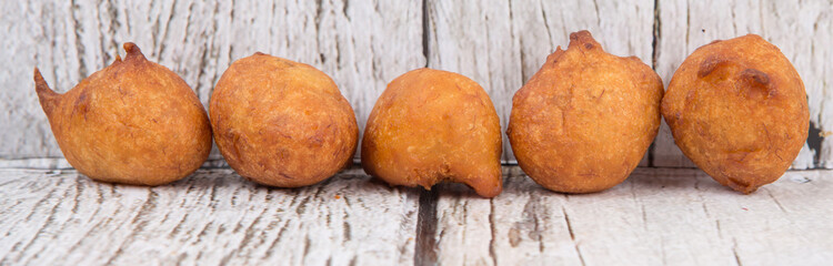 Popular Malaysian fritter snack deep fried banana balls or locally known as Cekodok Pisang 