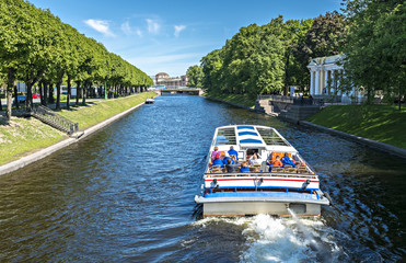 Pleasure boat in a canal of Sankt Petersburg, Russia