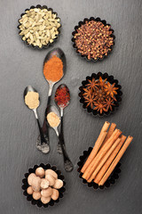 Spices on a black background. Top view