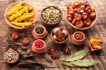 Spices and spicy on a wooden background. Top view, horizontal