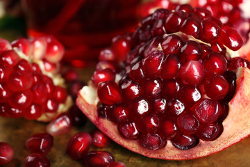 Fresh ripe garnet on table close up
